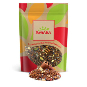 A 100g resealable pack of Bayara Cardamom Nights Tea showing a colorful loose-leaf herbal mix through a clear window.