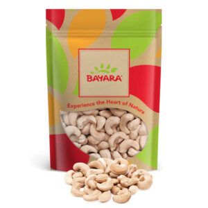 A 250g leafy-design bag of Bayara Cashews Jumbo Unsalted showing extra-large kernels through a clear window.