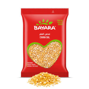 A 1kg red bag of Bayara Chana Dal with a heart-shaped window showing bright yellow split chickpeas.