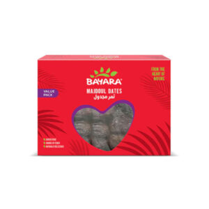A red 1Kg value pack box of Bayara Majdoul Dates with a heart-shaped window showing premium large dates.