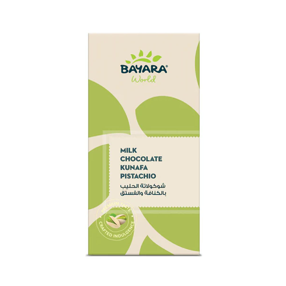 Filled Choco Kunafa Pistachio Milk Chocolate 230g A 230g cream and green box of Bayara World Milk Chocolate Kunafa Pistachio featuring a "Crafted Indulgence" seal.