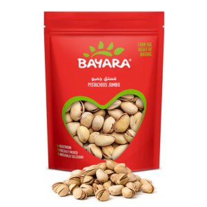 A red 200g pack of Bayara Pistachios Jumbo with a heart-shaped window showing large, roasted pistachios in their shells.