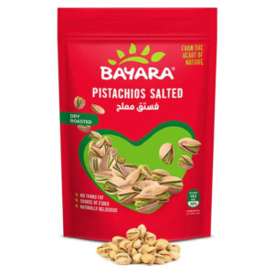 A red 300g resealable bag of Bayara Pistachios Salted with a heart-shaped window showing roasted nuts in their shells.