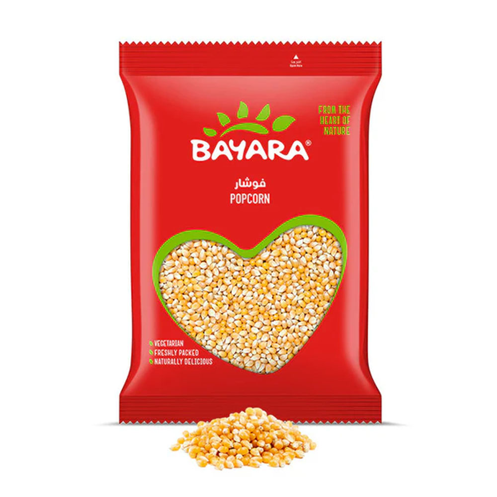 Popcorn 1Kg A 1kg red pack of Bayara Popcorn showing golden kernels through a heart-shaped window.