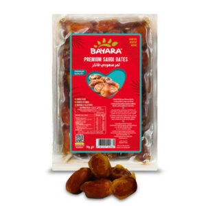 A 1kg vacuum-sealed pack of Bayara Premium Saudi Dates showing soft, brown dates inside a transparent wrap.