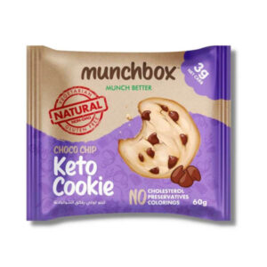 A blue and tan 60g wrapper of Munchbox Double Choco Chip Keto Cookie showing a dark chocolate bitten cookie and "5g Net Carb" label.
