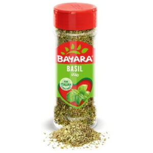 A 100ml shaker bottle of Bayara Basil showing dried green herb flakes and an Italian cravings label.