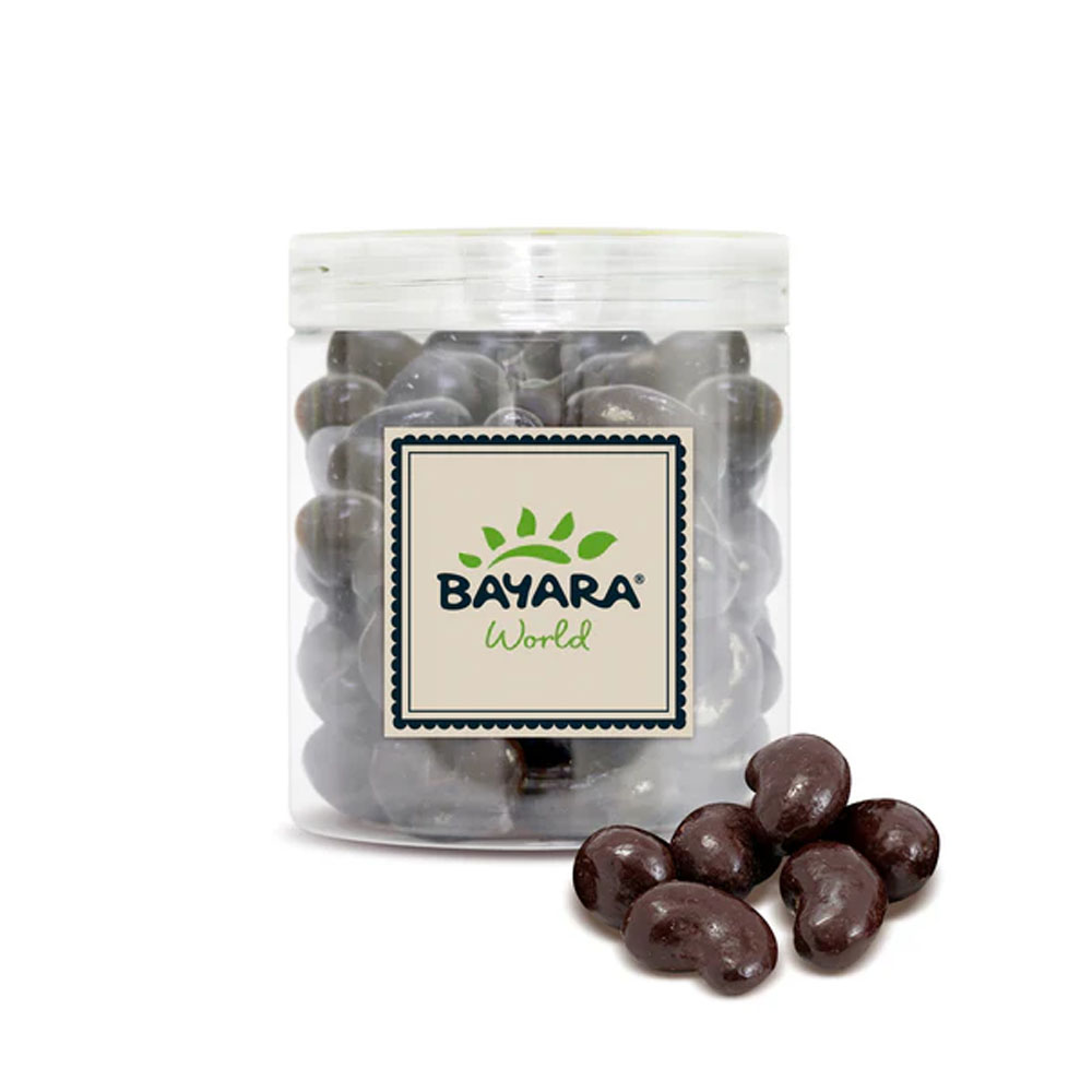 Dark Chocolate Coated Cashews 300g A 300g jar of Bayara Dark Chocolate Coated Cashews with a small pile of chocolate nuts in front.