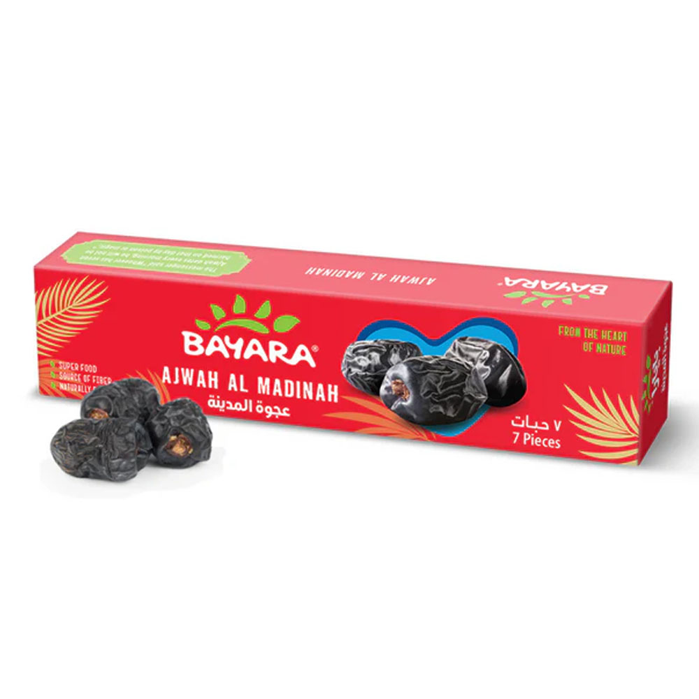 Dates Ajwah 7Pcs A slim red box of Bayara Ajwah Al Madinah Dates showing three dark dates next to the 7-piece packaging.