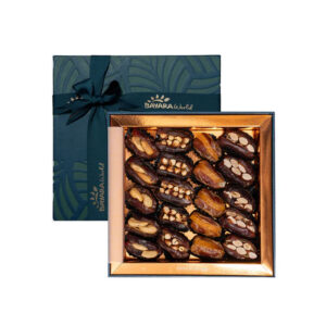A medium teal Bayara gift box with a gold tray containing rows of assorted stuffed dates with nuts.