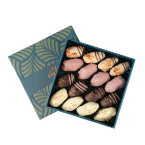 A small teal and gold Bayara gift box filled with assorted chocolate-coated dates in white, milk, and dark chocolate.