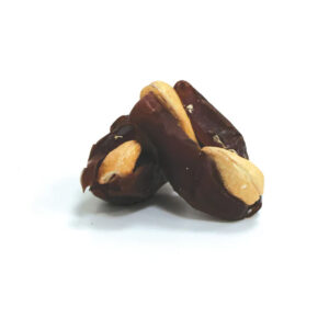 Two Bayara Cashew Stuffed Khudri-Dates against a white background.