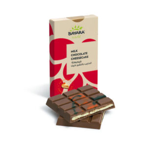 A 100g box of Bayara Milk Chocolate Cheesecake showing a snapped chocolate bar with a creamy white filling.